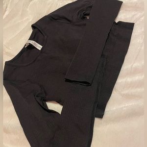 Black “ebb to street” long sleeve Lululemon top new with tags, never been worn.